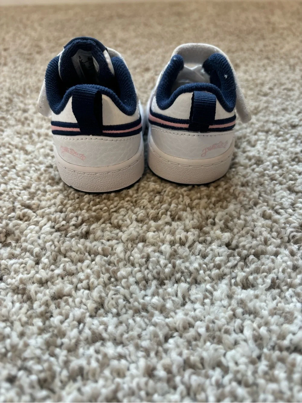Nike Kids White Sneakers with Navy Lining and Pink Swoosh